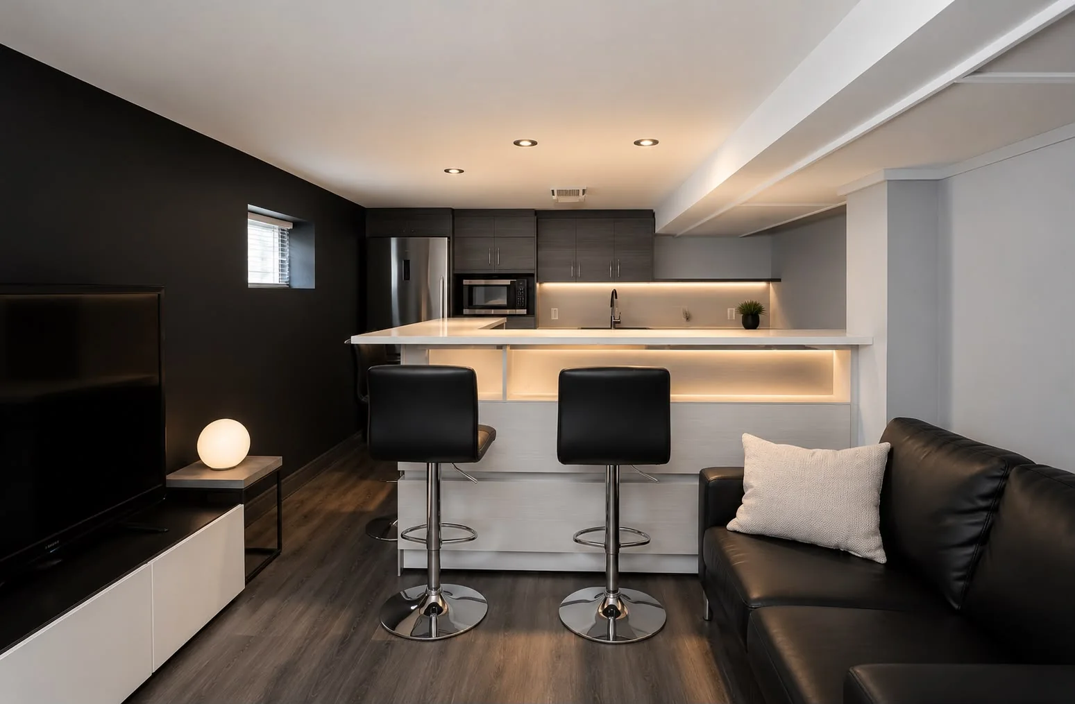 Break room with fitted kitchen, lit island and lounge corner